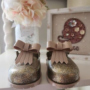 Mini Melissa Glittery Gold Dress Shoes with Bow